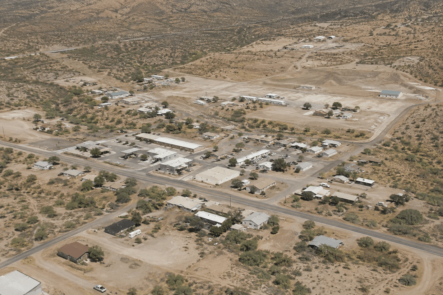 Aerial view of Surprise, Arizona showing residential neighborhoods, roads, and the surrounding desert landscape.