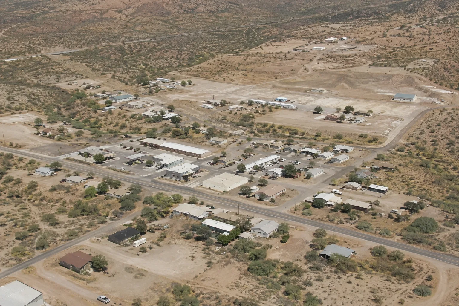Aerial view of Surprise, Arizona showing residential neighborhoods, roads, and the surrounding desert landscape.