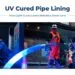 A glowing LED-cured liner being fed into a sewer line during a UV cured pipe lining installation